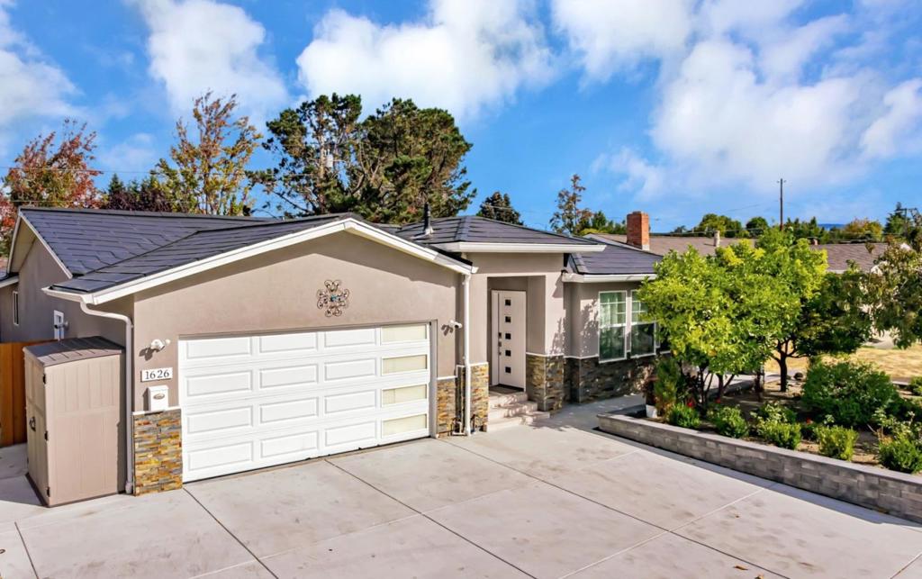 This beautiful turnkey 4BR/3BA single level home spans approx. 1,923 sq ft and offers the perfect balance of style, comfort and convenience - giving you peace of mind with no major projects needed! High ceilings, abundant windows and skylights fill the open room layout with natural light creating a bright, welcoming space. The home was transpired, and additional living space was created in 2019. The complete renovation introduced new: flooring/windows throughout, a stylish kitchen with stainless mosaic tile and granite counters, spa-inspired bathrooms and HVAC system. Recently, the home has again been elevated with a Tesla Solar Roof (owned!), power wall and vehicle charging station, main panel upgrade, Samsung kitchen appliances, Indow window inserts, whole-house water softener, 3 phase water purifier, hardscaping creating usable/low maintenance space and a dry sauna to pamper yourself - making this home as luxurious as it is functional. Two ensuite bedrooms provide privacy for you and your guests. Nestled in one of the most central commute locations of Silicon Valley, you are a few-minute walk to Apple, minutes to Nvidia and access to Silicon Valley's tech corridor. Located near highly rated schools, restaurants and shopping, you are going to love calling this home!