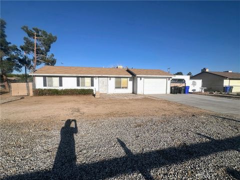 Photo of 12716 Iroquois RD, Apple Valley, CA 92308 (MLS # IG26101782)