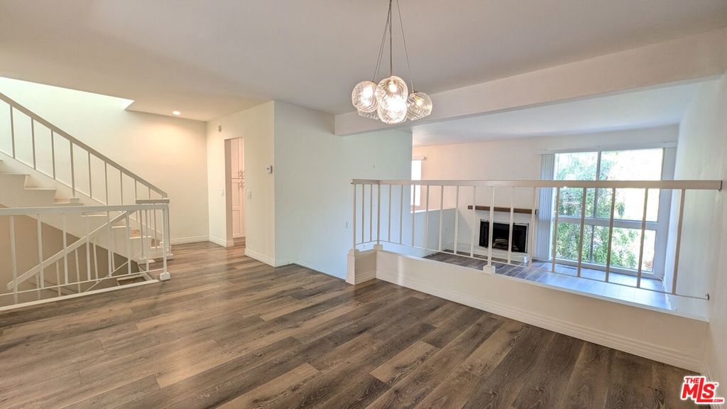 Welcome to this beautifully updated tri-level home offering comfort, style, and versatility. Enter through the attached two-car garage into the mid-level, where you'll find a thoughtfully designed kitchen, dining area, and convenient powder room. Just a few steps down, the spacious living room invites you to relax or entertain in style .Upstairs, the generous primary suite features three closets and a beautifully appointed en-suite bathroom. The lower level offers additional flexibility with a full bedroom and bathroom, plus a large bonus room complete with its own closet ideal as a third bedroom, home office, or cozy den. This level also includes a charming front entry and a private patio perfect for enjoying your morning coffee or evening unwind. Enjoy resort-style living with access to the community's newly updated amenities, including a sparkling pool, relaxing spa, fitness center, and tennis courts.