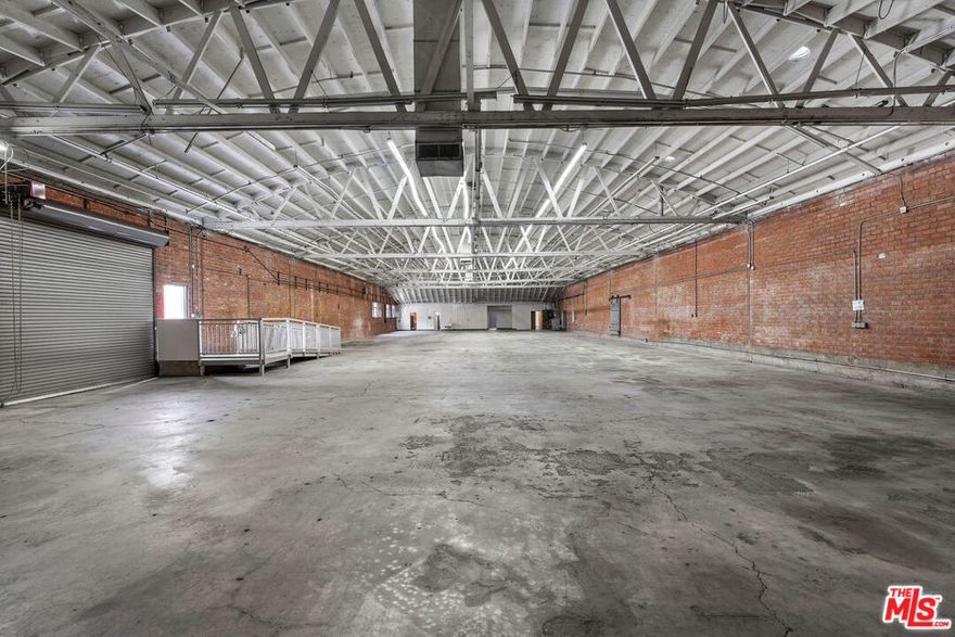 Exceptional Free-Standing Warehouse / Light Manufacturing Facility  Prime Jefferson Blvd Frontage Now available for immediate occupancy, this pristine single-level, free-standing Bow Truss building offers a rare combination of functionality, visibility, and value situared on a gated secure campus.  Ideally suited for warehouse, light manufacturing, or creative industrial use, the property features approximately 80 linear feet of high-visibility frontage along Jefferson Boulevard. Highlights include: Clear Height: 18-foot ceiling clearance Power: Robust electrical infrastructure with 3 separate meters 200 Amp, 120/240V 100 Amp, 240V 400 Amp, 480V Lighting: Existing electrical drops for flexible lighting configurations; abundant natural light complemented by fluorescent fixtures Access & Parking: Secured and gated lot with 10 reserved parking spaces and convenient roll-up door access Amenities: ADA-compliant ramp, sprinkler system, newer roof, and newer evaporative cooling systems Zoning & Use: Not permitted for cannabis-related activity Strategically located near USC, Downtown Los Angeles, and major freeways, this centrally located property offers exceptional accessibility and functionality. Priced competitively for the market, this is a rare opportunity for businesses seeking a well-maintained industrial space with immediate potential. Ready for occupancy.