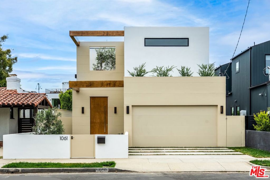Welcome to this freshly reimagined modern oasis in the heart of Venice. This 4-bedroom, 4.5-bath home has been thoughtfully upgraded with all-new plumbing, electrical, HVAC, and roof, offering a seamless blend of style, comfort, and peace of mind. Step inside to discover wide-plank French White Oak flooring and solid core doors throughout, adding warmth and quiet luxury. The open-concept layout is anchored by a custom chef's kitchen featuring sleek cabinetry, premium appliances, porcelain countertops, and dramatic 9' doors that lead to sun-filled outdoor spaces. Recessed lighting and large windows flood the home with natural light, while the built-in barbecue area is ideal for al fresco entertaining beneath the stars. Downstairs bedroom includes an en-suite bath, but the true showstopper is the primary suite a spa-like retreat with a luxurious master bathroom, complete with designer finishes, a soaking tub, and walk-in shower. This turnkey property delivers elevated beach living just minutes from Abbot Kinney, world-class dining, and the sand.