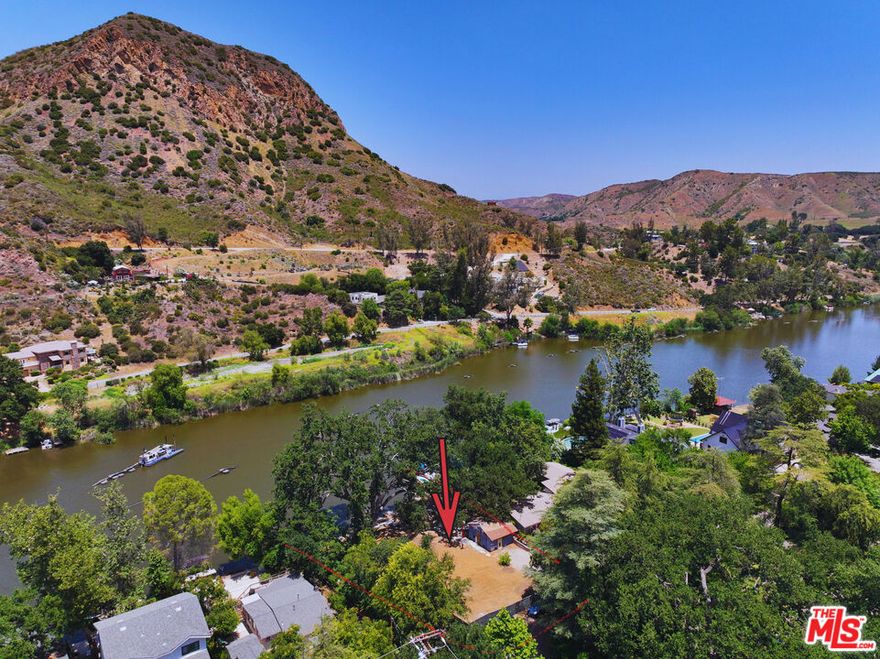 *Seller financing available* Plans available* Prime Vacant Lot Next to Malibu Lake. Development Opportunity with Stunning Lake Views. Seize the opportunity to own a picturesque vacant lot adjacent to the serene Malibu Lake. This exceptional property offers not only breathtaking views but also significant development potential, making it an ideal investment for builders and visionaries alike. Experience unparalleled vistas of Malibu Lake, perfect for creating a tranquil retreat or luxury residence. Embrace an outdoor lifestyle with easy access to water activities, hiking, and the natural beauty of the Malibu region, making this location a haven for nature enthusiasts. Don't miss your chance to develop in one of California's most desirable locations. This vacant lot next to Malibu Lake is a rare find.