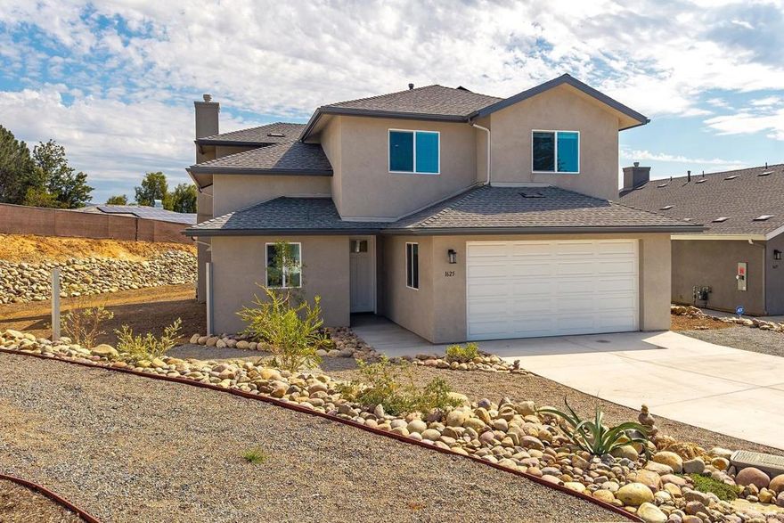 Stunning brand new 2 story design with attached garage and access for RV, boat etc...Spacious usable backyard perfect for entertaining. Peacefully tucked away location near Olive Hills. Smart floor plan boasting 4 bedrooms plus office/game room area. (2) Master suites with 1 bedroom downstairs. Gorgeous kitchen with quartz countertops and custom backsplash, soft closing cabinets, SS appliances, recessed lighting etc. Also, LVP flooring thru-out, whole house fan, ceiling fans, vinyl dual pane windows, upstairs laundry room, tankless water heater...Agents, show your pickiest clients this absolute treasure. PAID solar panels.