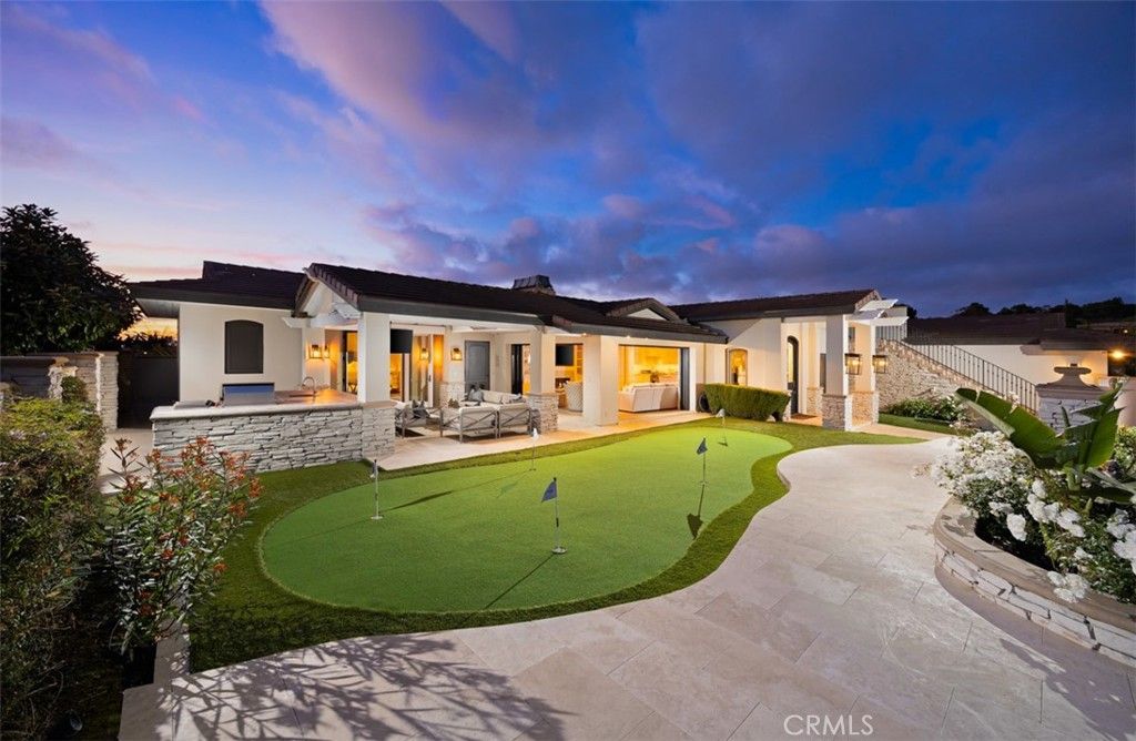 Photo of 515 Cameo Highlands Dr, Corona Del Mar, CA 92625 (MLS # OC26070404)