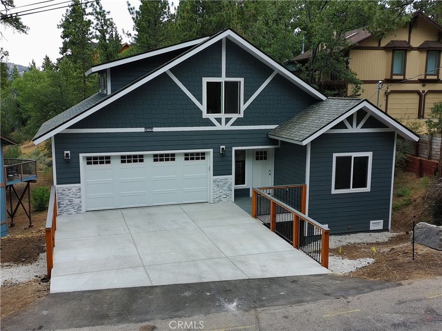 No more waiting. Brand new custom home in the desirable neighborhood of upper Moonridge.  Minutes away from skiing, golfing, the Village, and zoo. 5 bedrooms and 3.5 bathrooms make this an ideal family home or high rental income potential investment property.  Loft with powder room over the garage can be used as an extra living room, game room, or large bedroom.  Kitchen/Dining/Living room features gas fireplace, abundant natural light, high Pine ceiling, and deck with nature/mountain view.  Decking is durable and low-maintenance Trex material. Deck has gas line for BBQ. Large primary bedroom has walk-in closet and private covered deck.  Waterproof laminate flooring throughout and tile bath floors.  Home is prewired for future 220 volt needs including EV charger.  High-quality garage epoxy floor.  Custom window blinds throughout. Large extra storage space under garage.  Must see to appreciate this unique opportunity!