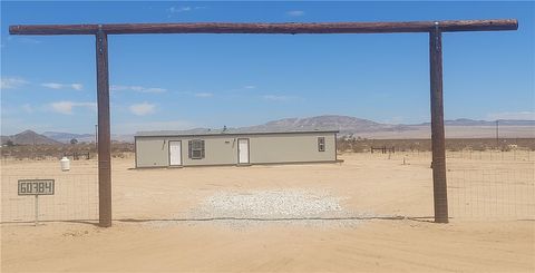 Photo of 60784 Stagemans Road, Landers, CA 92285 (MLS # IV25109815) Photo of 60784 Stagemans Road, Landers, CA 92285 (MLS # IV25109815)