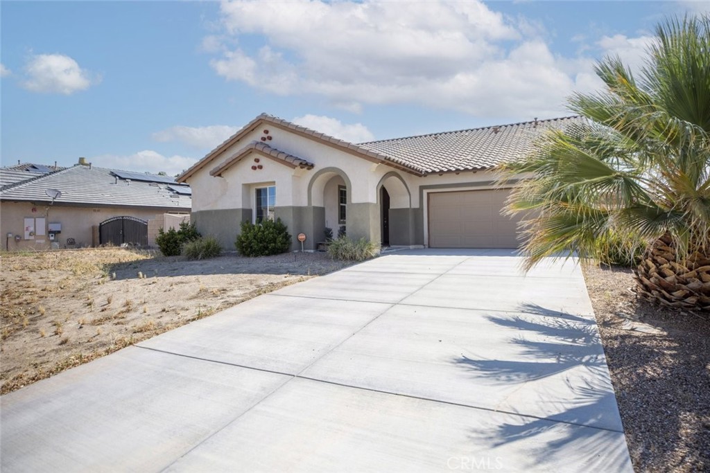 This beautifully designed 3-bedroom, 3-bathroom luxury home offers 1,831 sq ft of refined living space in a prime Lancaster location. From its modern interior to its advanced safety features, this home blends style, comfort, and peace of mind. The open-concept layout showcases a spacious living and dining area with sleek tile flooring, recessed lighting, and a warm, inviting fireplace. The kitchen is a standout, featuring stainless steel appliances, a generous center island, and plenty of cabinetry, perfect for both casual meals and entertaining guests.
The expansive primary suite provides a private retreat, complete with a walk-in closet and a well-appointed en-suite bath. Two additional bedrooms offer flexibility for guests, a home office, or additional living space. A fenced yard and low-maintenance concrete slab backyard provide a private outdoor setting, while a small exterior storage room adds everyday convenience.