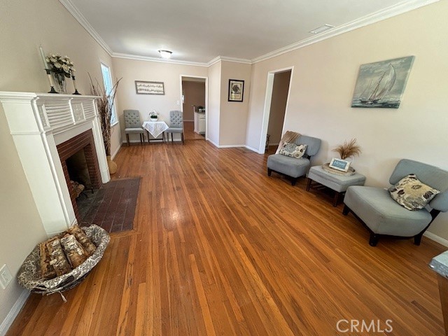 Tucked away on a quiet, tree-lined street, this charming 3-bedroom, 2-bath home offers comfort, privacy, and a fantastic layout. Behind tall fencing and an automatic gated driveway, you'll find a welcoming front porch that leads into a light-filled interior.
Step inside and you'll immediately notice the inviting living room—bathed in natural light from large windows and made cozy by a classic wood-burning fireplace. It's the perfect space for relaxing, entertaining, or dining.
The flexible floor plan includes a spacious family room that opens to the kitchen, creating a great flow for everyday living or hosting guests. This sunlit space offers plenty of room for an additional dining area or entertainment zone and leads right out to the private backyard.
Enjoy outdoor living under the covered patio, surrounded by mature landscaping and plenty of room to unwind or play.
Additional highlights include central heat and air, beautiful hardwood floors, newer windows, and an updated kitchen. There's so much to love—this home is ready for you to move right in!
With its thoughtful layout and versatile spaces, this home can comfortably accommodate families, pets, and guests alike. Come see it for yourself!