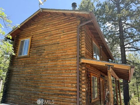 Photo of 33285 Angeles Dr, Green Valley Lake, CA 92341 (MLS # IV26112903)