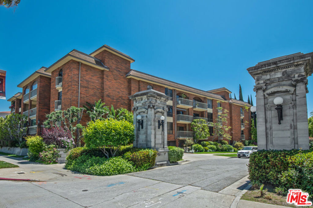 Beautifully renovated and perfectly situated, this spacious 2-bedroom, 2.5-bath residence in the highly desirable Chateau Fremont offers sophisticated living in one of the city's most convenient locations. Set within an intimate 18-unit boutique building near Hancock Park, Larchmont Village, Koreatown, and Paramount Studios, this home spans approximately 1,662 sq. ft. of stylish, light-filled interiors. The expansive living room features a cozy fireplace and opens to a sunlit balcony, creating an ideal setting for both relaxation and entertaining. A dedicated dining area flows seamlessly into a bright kitchen with a charming breakfast nook. The luxurious primary suite impresses with a generous walk-in closet, a spa-like bath, dual vanities, and a spacious shower. A secondary en-suite bedroom offers the perfect retreat for guests or a home office. Additional highlights include in-unit side-by-side laundry, secure gated parking with two side-by-side spaces, and unbeatable proximity to premier shopping, dining, and entertainment. Combining comfort, elegance, and convenience, this residence is a true gem in the heart of the city.