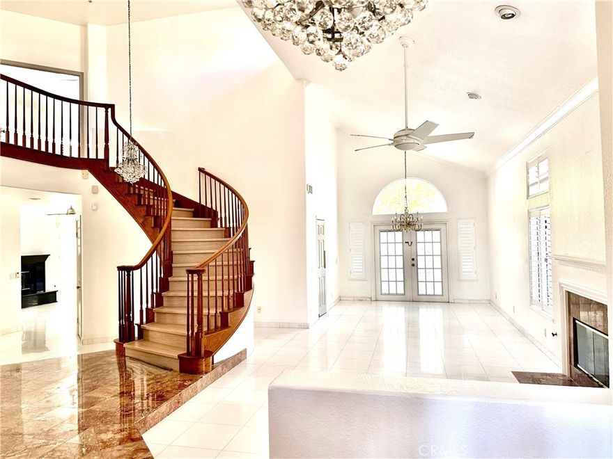 Reduced Rent price !!! This fabulous Two-story Mediterranean home sitting in a corner lot with all the wonderful upgrades, stylish and immaculate home was located in Rancho San Rafael area. This property has pvc flooring upstairs. New a/c unit was newly installed as well. It has a 4 bedroom (plus entertainment room that can be a fifth bedroom) plus 4 bathrooms. Completely remodeled kitchen w/ the high-end G.E. monogram appliances included (and built-in subzero). The family room opens to the kitchen. Marble fireplace in family area. Living room combined with dining room. Stylish, modern high-end ceiling fans throughout the house. Master suite w/ tub & shower, walk-in closet, double sinks. High Vaulted ceilings throughout. Windows are with customized plantation shutters, marble flooring and recessed lighting. Rose garden in the backyard. 3-car garage with plenty of closet space.  Enjoy all the luxuries of a gorgeous home. Tenants will have access to community amenities/tennis court. This is an immaculate home in a prestigious neighborhood with easy access to freeways to downtown and beyond.