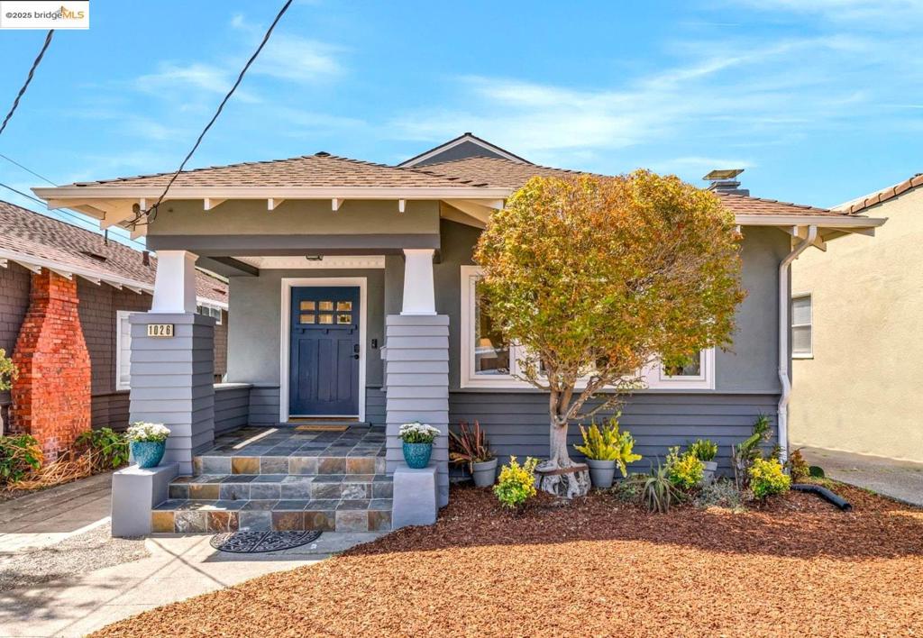 Welcome to 1026 Ventura Avenue, a beautiful 5BR/4BA Craftsman on a charming tree-lined street. This dreamboat location puts Solano Avenue cafés, Westbrae shops, and Hopkins Street favorites like Monterey Market moments away. Step inside through an inviting entryway w crown moulding & pocket doors into the light-filled living room, where original hardwood floors, a cozy fireplace, & picture windows frame a graceful maple tree. The spacious dining room w elegant wainscoting flows to an open kitchen outfitted w Viking appliances, quartz counters, & a breakfast bar. Three bedrooms on the main level offer flexibility, including an ideal guest or au pair suite w private entrance & convenient laundry. Upstairs, the primary retreat delivers Bay views, bath w dual sinks & walk-in shower & a sunny lofted den. Outside, the backyard is an oasis reimagined by the owners complete w pergola draped in flowering vines, porch swing, & patio w heat, fruit trees, & raised bed gardens. A finished outbuilding adds flex space for a gym, storage. Extensive upgrades include plumbing, wiring, foundation, dual-pane windows, tankless water heater, & central heat & AC, attic & wall insulation. Top-rated Albany schools, parks, & easy BART access make this the ultimate family-friendly hub for Bay Area living!