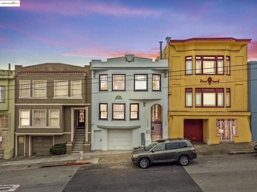 Opportunity meets elegance; a rare union of home and haven where live and thrive. Nested beside the University of San Francisco and a short stroll from Golden Gate Park and Haight-Ashbury’s cafés restaurants and shops, this classic home invites serenity and possibility. 1945 Fulton is a modern classic reimagined from foundation to rooftop: this 5 bed, 3 bath residence glows with energy and artistry. A 200 A panel with Level 2 EV charger, new plumbing, insulation, heat pump, and tankless water heater support new windows framing the skyline’s mix of modern towers and historic spires. The chef’s kitchen, crowned with Thermador appliances, double ovens, and a professional cooktop, welcomes both cook and dreamer. Upstairs (3 beds, 2 baths) offer tranquil views; below, a 2-bed suite flows to a sunlit garden where a mature lemon tree perfumes the air. Each level enjoys laundry and privacy. An ideal setting for an extended family or for income.