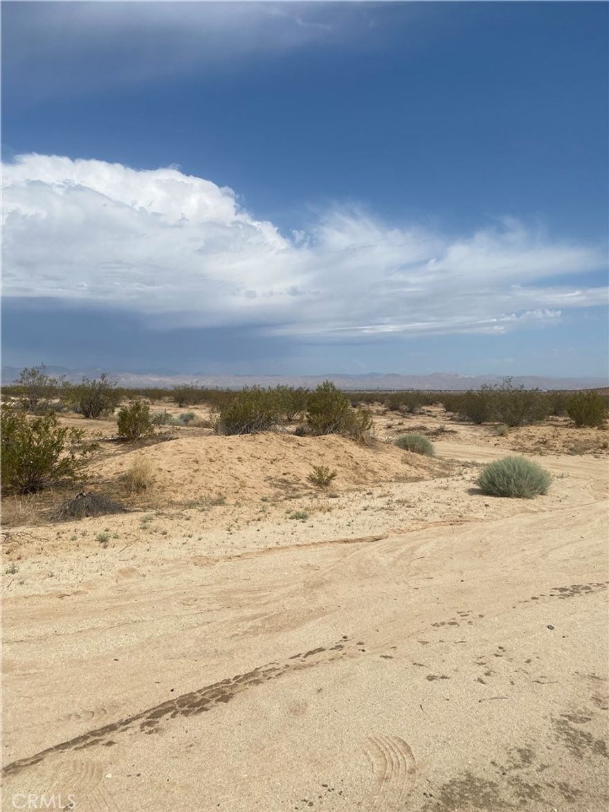 Build your dream home on over 2 acres in California City! Don’t miss this incredible opportunity to own a spacious residential lot spanning over 2 acres in one of California City’s most promising and rapidly growing areas. This lot features convenient road access, city water available, and electricity nearby. Surrounded by beautiful custom homes and stunning mountain views, this property offers the perfect setting for your future dream home or investment project. Secure your piece of California today!