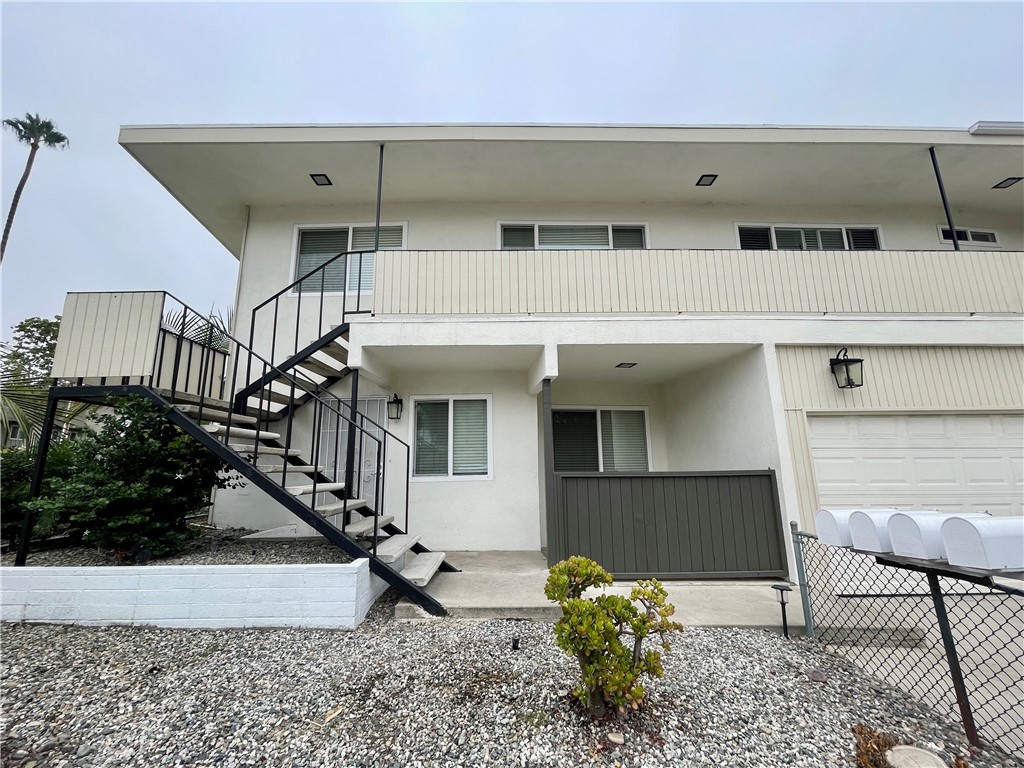 Experience the charm of this beautifully upgraded end-unit townhouse, offering 2 spacious bedrooms and a full bath upstairs, along with a convenient half bath on the main floor. This stylishly updated home features an amazing kitchen equipped with stainless steel appliances, including a counter-depth refrigerator, dishwasher, stove, and new microwave and luxurious kitchen cabinets and countertops. LVT flooring throughout. The bathroom has been enhanced with a new shower door, and the home is illuminated with recessed lighting. Perfectly situated near the beach and just across from Las Palmas, this home combines the serenity of coastal living. You'll have a designated space in a shared 2-car garage and access to onsite laundry facilities.