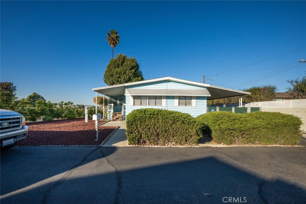 BEAUTIFUL HOME, LOCATION, AND PROFESSIONALLY LANDSCAPED PRIVATE REAR YARD WITH YOUR OWN 10X10 FOOT SHED! EXTRA LARGE REAR LOT WITH CONCRETE PAD TO ADD A SPA OR ADDITIONAL TOYS? FRESH PAINT THROUGHOUT THE INSIDE! OPEN GOURMET KITCHEN WITH PLENTY OF STORAGE CABINETS WITH LOTS OF COUNTER SPACE THAT OVERLOOKS THE SPACIOUS FAMILY ROOM. SLIDING GLASS DOOR OPENS TO ENCLOSED ARIZONA ROOM, GREAT FOR AN EXTRA OFFICE, HOBBY ROOM OR? LIVING ROOM WITH FRONT YARD VIEW AND YOUR OWN 2022 65 INCH WALL MOUNTED SMART FLAT SCREEN TV TO ENJOY. 2 INCH BLINDS COVERING MULTIPLE WINDOWS THAT BRING IN LOTS OF NATURAL LIGHT ALSO SKYLIGHTS! OPEN FLOOR PLAN THAT FLOWS COMFORTABLY THROUGH THE HOME. 2 WASHERS AND A LARGE DRYER IN THEIR OWN ROOM. NEWER GAS WATER HEATER IN 2022, REBUILT HEATING UNIT IN 11/2024. GAS OVEN WITH NEWER HEATING ELEMENT INSTALLED IN 11/2024. LOCATED IN A SECLUDED LOCATION WITH NO SIDE NEIGHBORS. PARK OFFERS IN GROUND POOL, BANQUET HALL, CARD ROOM, LENDING LIBRARY AND FULL KITCHEN FOR RESIDENTS TO USE! SHOPPING, GOLF, CHURCHES, LONG BEACH AIRPORT AND JOHN WAYNE AIRPORTS JUST MINUTES AWAY! A MUST-SEE HOME!