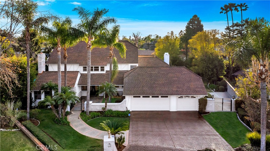 Traditional Non-distressed, property. Cash or Finance ok! Welcome to your private oasis in the heart of Villa Park. This sprawling estate features five spacious bedrooms and five luxurious bathrooms. Indulge your inner chef in the gourmet kitchen, boasting top-of-the-line appliances and sleek finishes. The hardwood floors add warmth and sophistication throughout. Host unforgettable gatherings in the elegant dining room, or unwind by the resort-style pool and spa. Entertain like a pro in the fully-stocked bar. The expansive backyard is your personal retreat, perfect for enjoying the California sunshine.