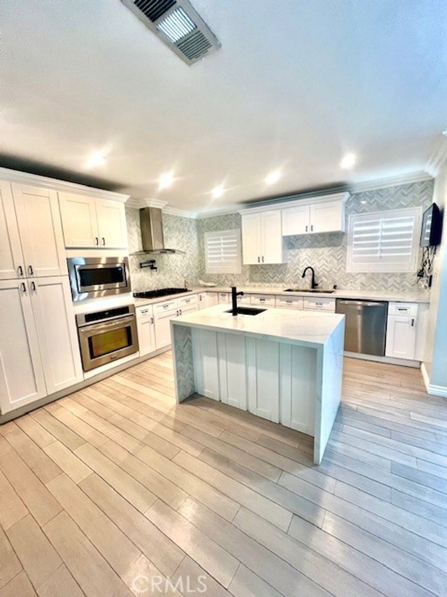 Stunningly Remodeled Home in Prime Location Near Topanga Village & Westfield Topanga!

Welcome to a beautifully upgraded home located in one of the most sought-after neighborhoods, just a couple minutes away from Topanga Village and Westfield Topanga. 

This meticulously remodeled residence blends modern luxury with everyday comfort, featuring high-end finishes, custom upgrades, and elegant design throughout with a Tesla Charging Station. 

Step inside to an open-concept floor plan that flows seamlessly between expansive living spaces. The heart of the home is the chef-inspired kitchen, showcasing top-of-the-line stainless steel appliances, sleek custom cabinetry, an oversized island, and designer fixtures — perfect for entertaining or quiet nights in.

The home offers generously sized bedrooms, each filled with natural light and style. Every bathroom has been thoughtfully redesigned to evoke a spa-like experience, with modern tile work and upscale hardware.

Step outside to a Professionally Designed Backyard Oasis — an Entertainer’s Dream. Whether hosting guests or relaxing in solitude, you’ll love the lush landscaping, Spacious Patio Areas, and Outdoor Kitchen, Tv and Surround System and Fire Pit. This private retreat is perfect for enjoying California’s indoor-outdoor lifestyle year-round. The Property is Completely Gated to Provide Security and Privacy 

Don’t miss this rare opportunity to live in a turnkey home in an unbeatable location, blending designer style, function, and​​‌​​​​‌​​‌‌​​‌​​​‌‌​​​‌​​‌‌​​​‌​‌​​​‌‌​ luxury.