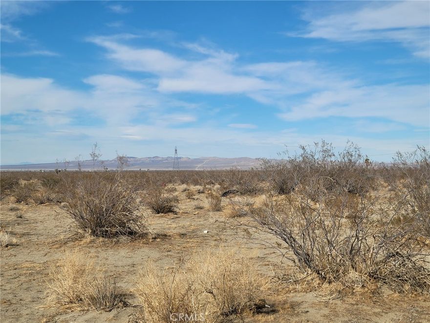 Discover the beauty and opportunity of this 6.675-acre parcel located in the quiet desert community of Phelan, California. This spacious lot offers flat, buildable terrain, perfect for creating your dream home, ranch, or investment property. Enjoy wide-open desert views, breathtaking sunsets, and the peaceful rural lifestyle that Phelan is known for. This property offers ample space for custom builds, horses, agriculture, or recreational use. It’s conveniently located near Phelan Road, with easy access to shopping, dining, and local schools. Utilities are nearby, making this a great choice for anyone looking to build now or hold for future development. Whether you’re dreaming of a private desert retreat or looking for a smart land investment, this prime 6.67-acre lot offers endless potential.