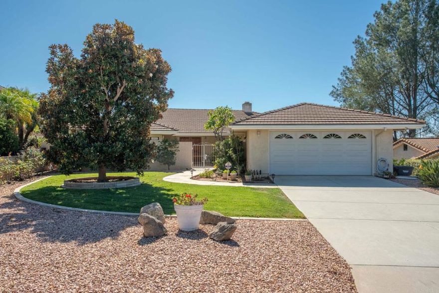 Single Level with Golf Course Views and Paid Solar!  Spacious Living Room and Family Room Overlooking a Patio, Putting Green, Golf Course and Sunset views from the West.  Tile flooring throughout living area with plush carpet in the bedrooms.  Dual pane sliding glass doors provide easy acess to back patio.  Separate Laundry room with half bath and direct access to the attached 2-car garage.    Flat driveway with plenty of parking spots.  Low HOA dues are only $396/YEAR and includes a Seasonal Community Pool and 2 Tennis Courts. Hidden Meadows Community has their own Fire Station, Two Markets/Deli's, the Sideyard Pub, a Public Golf Course with a restaurant/bar and is close to Shopping, Schools and 15 Fwy.