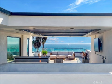 Photo of 816 Pacific Coast Highway, Huntington Beach, CA 92648 (MLS # OC26189191)