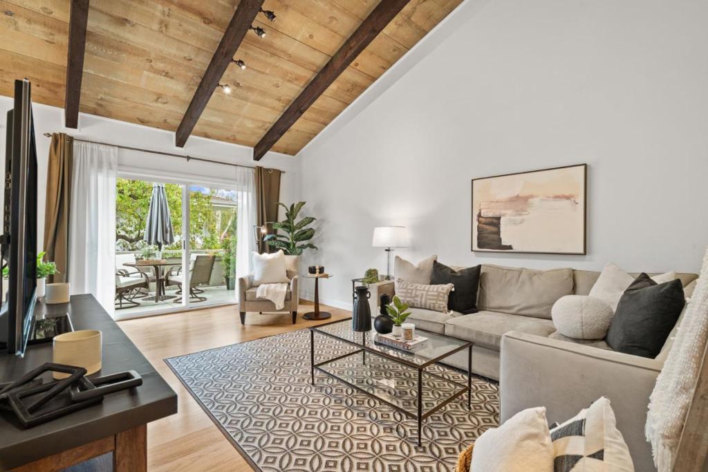 Beautifully updated 2BD/1BA top-floor condo with soaring vaulted ceilings in a prime Mountain View location! Enjoy two pools, gym, billiards room, lush greenbelts, car wash stations & more. Next to the new Community Center with tennis courts, parks, and recreation. Close to Caltrain, shopping, dining & major tech. Stylish, move-in ready living in the heart of Silicon Valley!