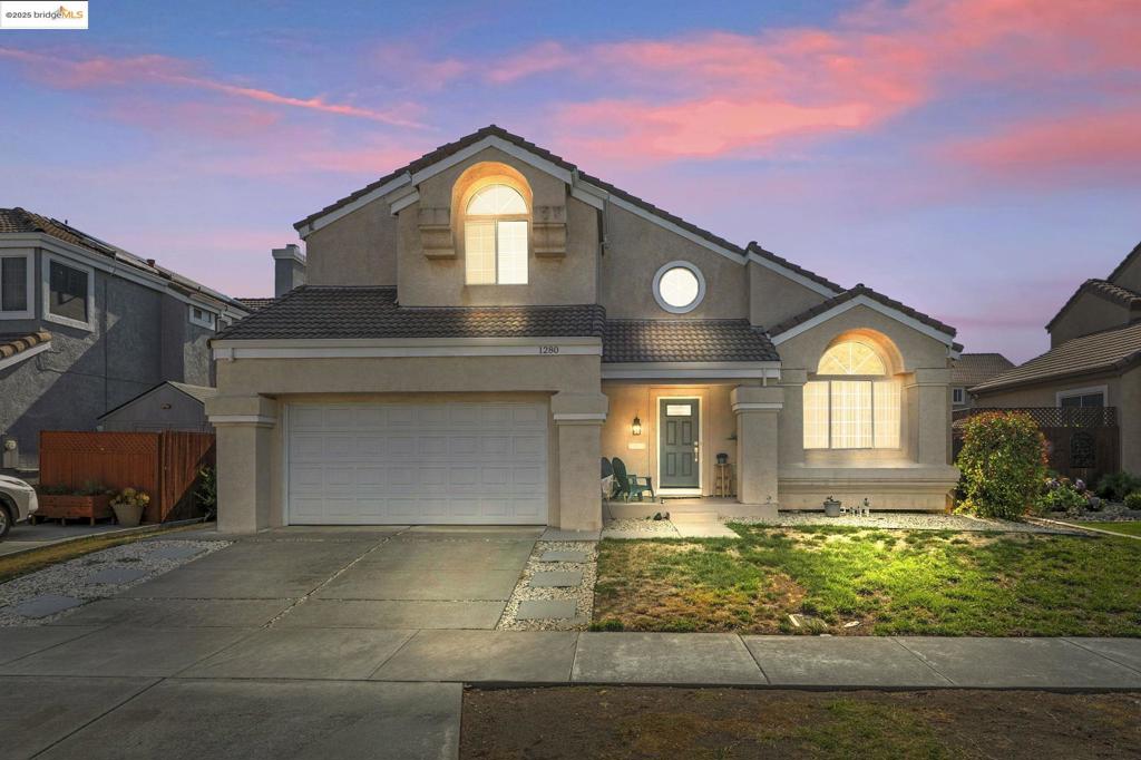 This home is an absolutely lovely and spacious oasis nestled in the highly desirable Lawler Ranch community. Offering over 2,200 square feet of well-designed living space, this beautifully updated residence features 3 generously sized bedrooms, 2.5 baths, and a layout perfect for both daily living and entertaining. As you step inside, you'll be greeted by stunning luxury vinyl plank flooring that spans the entire first floor, setting a tone of warmth and modern style. The second floor continues the updated aesthetic with brand-new carpet and luxury vinyl tile in all the right places, creating a fresh, inviting atmosphere throughout.The heart of the home is the open-concept kitchen, thoughtfully remodeled to combine style and functionality. It boasts a large kitchen with granite counter-tops and bar seating, ideal for casual meals or entertaining, along with brand-new stainless-steel appliances and sleek finishes that elevate the space. Each bathroom has been tastefully enhanced with updated vanities and modern lighting, giving a fresh and refined look that complements the rest of the home. With its generous backyard, abundant space and a location in a well established and desirable neighborhood close to parks, shopping, schools and freeways,this gem is one you don't want to miss!