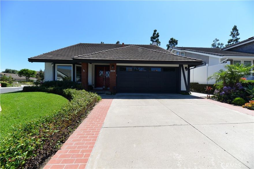 Fantastic opportunity to live in this BEAUTIFUL centrally located 3 bedroom 2.5 bath two story home in the highly desired coastal community of "STRATFORD AT THE PACIFIC" in Dana Point! Set on a LARGE corner lot, this LIGHT & BRIGHT gem boasts a SPACIOUS FLOOR PLAN, vaulted beam ceilings, formal living room, formal dining room with built in cabinets & buffet counter. Separate family room has cozy fireplace, recessed lighting, darling wet bar nook with floating shelves & sliding doors to private back yard. The tastefully upgraded kitchen is complete with custom white cabinets, quartzite countertops, gas range, built in oven & microwave, recessed lighting, plus bay window allowing natural light to brighten the day! Upstairs you will find the 3 bedrooms all with mirrored closet doors featuring GEORGEOUS CUSTOM HARDFLOORING. The two secondary rooms have lighted ceiling fans and are adjoined by a shared bathroom. Primary Bedroom and Bath are also quite spacious providing two closets, custom tiled walk-in shower, separate tub, separate commode room, dual vanities, lots of counter space and extra cupboards for lots of storage! Additionally, the upstairs hallway has a very generous sized walk-in closet for even more storage! Outside ENJOY the EXPANSIVE enclosed rear yard complete with covered spa perfect for entertaining! 1/2 bath is downstairs along with separate cabinet/countertop area for even more storage leading directly to two the large car garage with even more storage overhead PLUS EV CHARGING OUTLET! Close to Dana Point Harbor, Downtown San Juan Capistrano, Restaurants & Shopping! LOVE WHERE YOU LIVE!