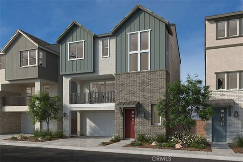 Photo of 309 Pluto, Irvine, CA 92618 (MLS # OC26085434)