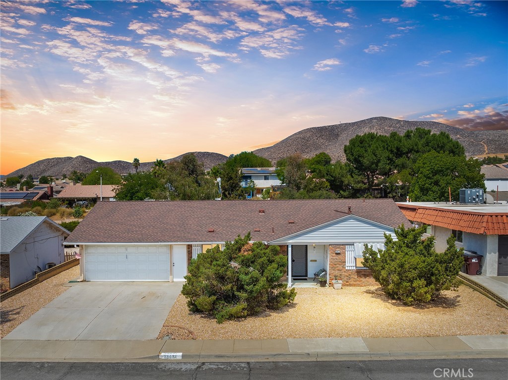 Updated Sun City Home – Bonus Spaces, Fresh Upgrades & Resort-Style Amenities. Welcome to this beautifully refreshed ranch-style home in the desirable 55+ community of Sun City, located in the growing city of Menifee. With 2 bedrooms, 2 bathrooms, and over 1,140 sqft plus bonus areas, this home offers comfort, flexibility, and charm. Inside, you’ll find brand new carpet and interior paint throughout, a spacious living room, and a bright kitchen with a breakfast nook and included refrigerator. The kitchen and bathrooms feature tile flooring and new recessed lighting, while the bathrooms have newly glazed countertops and shower/tub areas for a clean, updated look. The layout includes one bedroom in the front of the home, positioned right next to a full bathroom, and a private primary suite in the back with a walk-in closet, sitting area, and a bathroom with a walk-in shower. A standout feature is the enclosed lanai (~200 sqft), which is now part of the main home with its all-new paint and carpet—perfect as a sunroom, craft space, or cozy retreat (owners believe this space is in addition to the listed square footage). The attached 2-car garage also includes a spacious workshop (~245 sqft) where the washer and dryer (included) are located—an incredibly versatile bonus space that everyone loves when they see it. Outside, enjoy mature water-wise landscaping and two charming backyard sheds—ideal for gardening, hobbies, or extra storage. As a resident of the Sun City Civic Association, you’ll have access to a wide array of amenities: two swimming pools, a spa, fitness center, pickleball courts, indoor tournament shuffleboard, horseshoe pits, lawn bowling, and clubs and social events that make it easy to enjoy the active 55+ lifestyle. Close to restaurants, shopping, and services—this move-in-ready home has so much to offer!