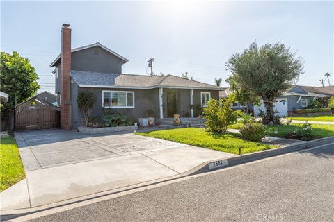 Photo of 7562 Calmcrest Drive, Downey, CA 90240 (MLS # OC26183578)