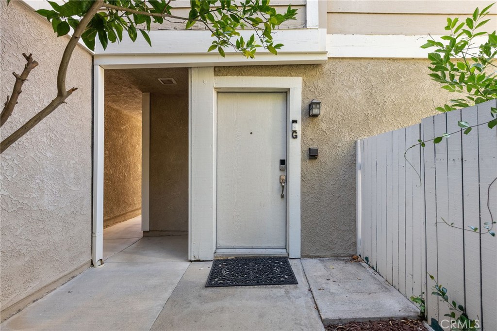 Welcome to this beautifully updated Cimarron Oaks townhome! This bright and spacious home features new flooring, vaulted ceilings, a cozy gas fireplace, and an abundance of natural light. The kitchen is light and inviting, and the home boasts two large balconies—one off the living room and another off the primary suite. Enjoy generous-sized bedrooms with wide hallways and ample closet space. The attached garage offers direct access, convenient laundry, and extra storage. Residents enjoy fantastic amenities including a pool, tennis court, and paid trash service, all with low monthly dues in a VA loan-approved complex. Ideally located near the 5 freeway, Castaic Sports Complex, and the brand new Aquatic Center—this is SoCal living at its best!