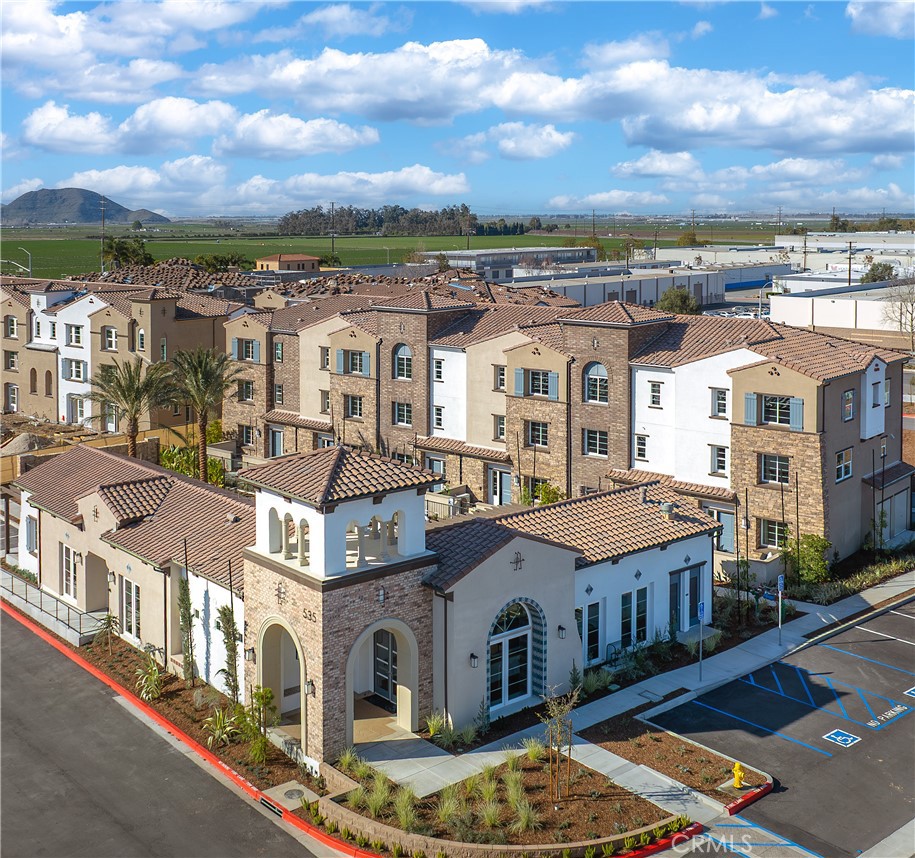 Located in the new fast-selling Camarillo community, Palmera, this beautiful December completion new split level entry townhome offers 2 bedrooms and 2.5 baths and also comes with a spacious bonus room that offers you unlimited options. No upgrades necessary, this home comes with stunning white polished porcelain kitchen countertops with full custom backsplash and upgraded LVP flooring. Palmera will offer a full gym, 2 pools, study space, a clubhouse and a dog park as well as onsite shopping and dining!
Palmera is a new vibrant townhome community located in the city of Camarillo. With a moderate Mediterranean year-round climate, Camarillo is considered by many to have the best weather on earth. Palmera is the place you will want to call home, located next to miles of beautiful farmland but close to all the amenities Camarillo has to offer. We are just 15 minutes to gorgeous coastline and beaches, the legendary Camarillo Outlets, and less than a moment’s drive to the Metro Link/Amtrack station. Palmera is just a stroll to Old Town which offers great restaurants, bars, boutique shops, salons, art, and entertainment. Not to mention the farmers market every weekend. There is a first-floor bonus room that can function from a home office to a game room and everything in-between! The second floor with 9' ceilings is open concept with eat in kitchen, spacious dining and living areas perfect for family fun and entertaining friends. All bedrooms are on the 3rd floor which also offers 9' ceilings. Pictures ae of model home, location and finishes will vary.