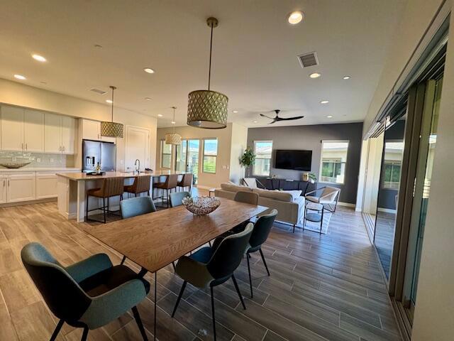 Welcome to this stunning 3-bedroom, 4-bath penthouse with its own private Elevator at The Retreat at Desert Willow, where luxury meets privacy. Located in a premier & desirable area, this home boasts park & mountain views. Interior location ensures both privacy & lovely views. Home features an open concept design with plenty of natural light. Designer finishes such as modern cabinetry, quartz countertops, porcelain tile flooring, & custom window treatments highlight the sophistication of this space which also features brand new bedroom carpeting & paint. The spacious kitchen is a chef's dream, featuring sleek modern cabinetry, quartz countertops, a stainless-steel appliance suite, & a detached island that opens to the dining & living areas. Kitchen also has a pantry with a coffee bar/appliance center. Separate laundry room has a quality washer & dryer as well as a sink for added convenience. The light & bright living & dining room area has sliding glass doors seamlessly connecting the interior to the expansive outdoor living area, which features a large entertainment deck with an outdoor fireplace & TV, creating a true resort-like experience. Primary Ensuite has direct access to the expansive deck, a spacious walk-in closet, & a luxurious private bath with dual sinks, a large walk-in shower, & a delicious soaking tub. The south-facing Junior Ensuite guest room also boasts a slider with access to its own private deck, a large walk-in closet, & a private ensuite bath with dual sinks & a walk-in shower. The east-facing Bedroom Three can also be a den with convenient access to a nearby bathroom with a 3rd patio directly across facing west. There is a BONUS bathroom in the downstairs entry by the elevator. Comes with 3 TV's. This penthouse also features an attached two-car garage & offers access to an array of resort-style amenities, including two community pools (lap & recreation), a clubhouse with billiard & ping pong tables, a fitness center, & a golf discount & early tee times at Desert Willow Golf as well as dining discount & complimentary access to the Golf Academy driving range (there's a private golf cart gate with access to the club ). Has charging area for golf carts. Includes cable (HBO, Showtime, & high-speed internet), common area fire insurance, water, pest control, & landscaping. Don't miss your chance to own this exceptional penthouse and live the Desert Dream in one of the best locations in the Coachella Valley. This home is priced to Sell!