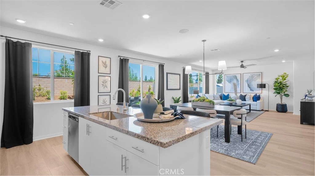 NEW CONSTRUCTION! Ready for Quick Move-in! This new two-story home offers ample room to live and grow. A bedroom and full bathroom are secluded near the front off the entry, adjacent to a spacious and inviting open-concept layout where the kitchen, living and dining areas meet. Two additional bedrooms and a luxurious owner’s suite share the second floor with a versatile loft.The kitchen features new caledonia granite counters and white cabinetry.
Estrella is a gated community of brand-new single-family homes for sale, coming soon to Moreno Valley, CA. Residents will enjoy access to onsite amenities, including a pocket park with shade structures, a tot lot and BBQ area. Estrella is located near the March Air Reserve Base, perfect for military families and personnel. Head over to the Lake Perris State Recreation Area to enjoy the outdoors, with opportunities to boat, hike and more, or enjoy endless recreation options at nearby Lasselle Sports Park.