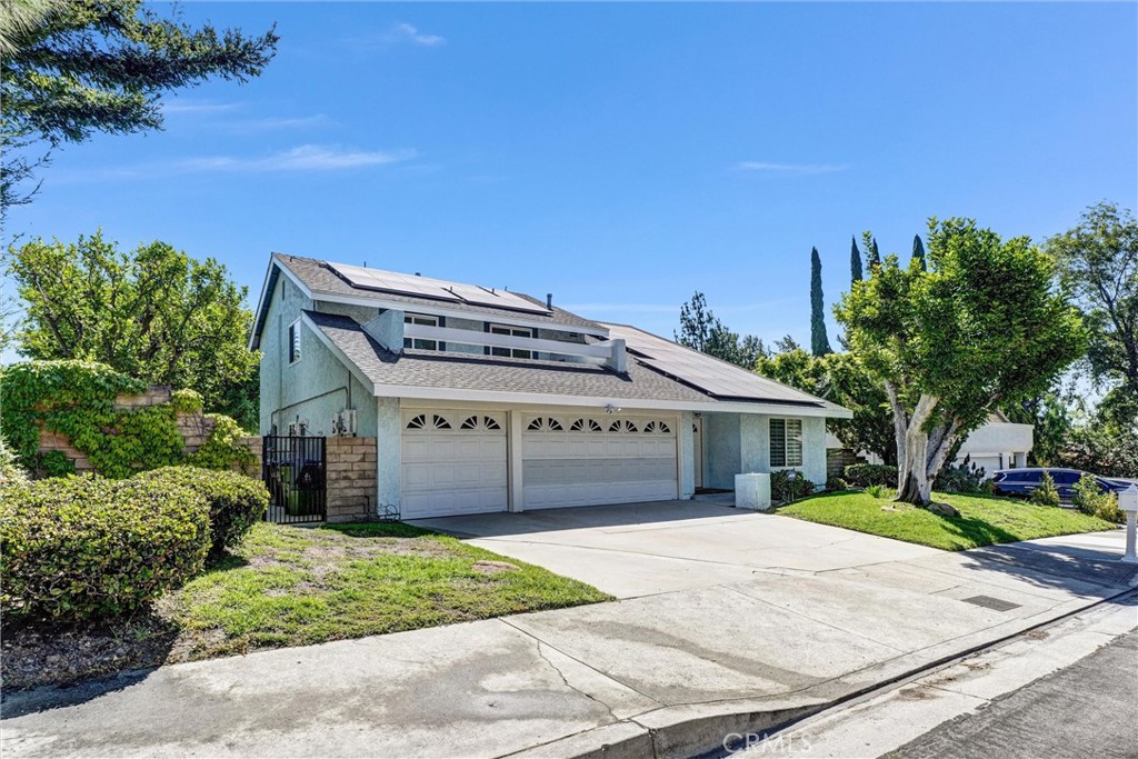 Welcome to your dream home, ideally located in the highly sought-after Porter Valley Country Club community! This exceptional property features a total of five bedrooms, including four spacious bedrooms upstairs, one of which is a master suite with a balcony overlooking the golf course and stunning mountain views. On the main level, you’ll find an additional bedroom and a full bathroom, providing convenience for guests or family. The home also includes a dedicated laundry room and a three-car garage. Step outside to the expansive backyard, where you can enjoy breathtaking views of the seventh fairway and a sparkling swimming pool, perfect for entertaining family and friends. With easy access to top-rated schools, popular dining, shopping, and the 118 Freeway, this home truly has it all. Don’t miss your chance to call this wonderful property your home.