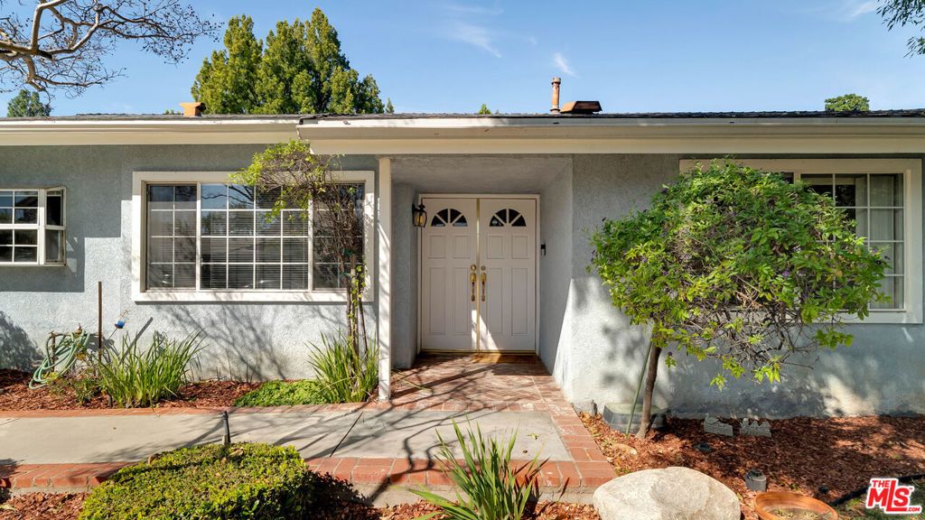 Photo of 18501 Germain Street, Porter Ranch, CA 91326 (MLS # 26666229)
