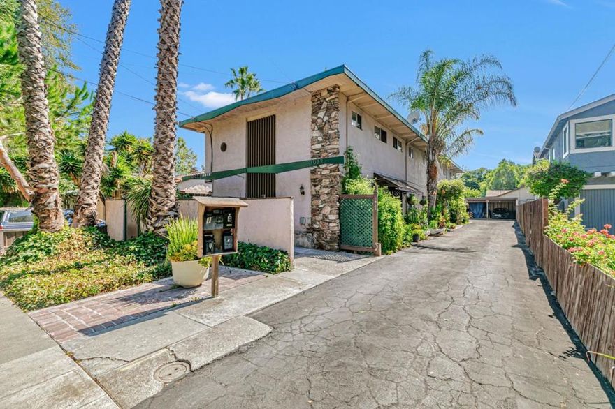 Marcus & Millichap is excited to present 1022 Vermont Street, a charming five-unit townhome-style apartment community ideally situated on the border of San Jose and Santa Clara. Built in 1965, the property spans 3,910 rentable square feet on a generous 7,500 square foot lot. Each of the five spacious one-bedroom, one-bathroom units is designed in a two-story townhome layout, offering tenants privacy and comfort. Every unit features its own private backyard patio, enhancing livability and tenant retention. The property also includes a dedicated laundry room and reserved covered parking under a detached carport. The exterior is thoughtfully landscaped, contributing to strong curb appeal and a welcoming residential atmosphere.