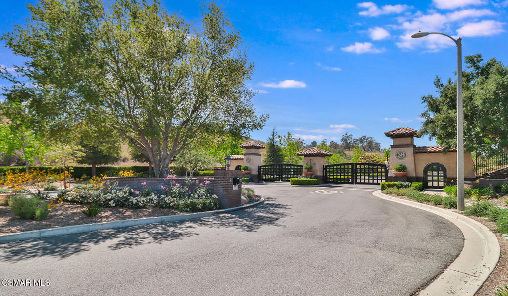 Welcome to this stunning French Provincial Estate in the exclusive gated Pinnacle Highlands. Situated on a generous 30,027 sq. ft. lot backing to open space, this exquisite 4,364 sq. ft. residence offers 5 bedrooms, 5.5 baths, plus a versatile loft with a private balcony. Featuring a bright open floor plan with impeccably finished Versailles stone and tiger hardwood flooring throughout, this home offers both elegance and functionality. As you enter home through the paved-tiled walkway, you are greeted by an abundance of living spaces including an elegant living room with a fireplace, formal dining room, gourmet kitchen, and spacious family room with serene views of the lush yard and the open space. The kitchen showcases granite countertops, an expansive center island, upgraded stainless steel appliances including a built-in refrigerator, a butler's pantry, wine closet, and a sunny breakfast room. Upstairs, The luxurious primary suite boasts unobstructive hills views, dual closets, a soaking tub, a walk-in shower and marble countertops. A secondary master suite includes its own private bath, walk-in closet, and Juliet balcony. Step outside to an entertainer's dream yard with a covered patio, lush green lawn, a variety of fruit trees such as lemon, apple, and fig, and a tranquil view of the hills - perfect for relaxing or hosting guests. Additional highlights include a 3-car garage with storage, solar system, crown moldings, plantation shutters, paver-tiled driveway, and no Mello-Roos. Desirably located near the adjacent 7-acre community park with tennis and basketball courts, schools, dining, shopping and freeway. This home is a must see!