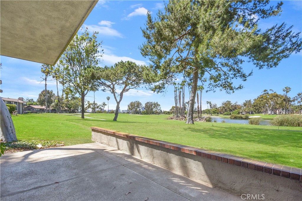 This lower-level condo sits along the 12th fairway of Rancho San Joaquin Golf Course, offering wide open views and a peaceful, interior location away from busy streets. With 2 bedrooms, 2 baths, and approximately 1,404 SQFT, the layout is both spacious and functional.
Upgrades include hardwood flooring in the entry and kitchen, Caesarstone countertops, refinished cabinetry, stainless steel appliances (including a gas range and French door fridge), updated lighting, crown moulding, and wainscoting. Enjoy indoor-outdoor living with two private patios—one off the kitchen and one off the living room—both showcasing the scenic golf course backdrop. A detached two-car garage with storage, in-unit laundry, and a charming garden window round out the highlights. Conveniently located near Mason Park, Rancho San Joaquin Golf Course, University Center, and just minutes to Newport Beach and major freeways.