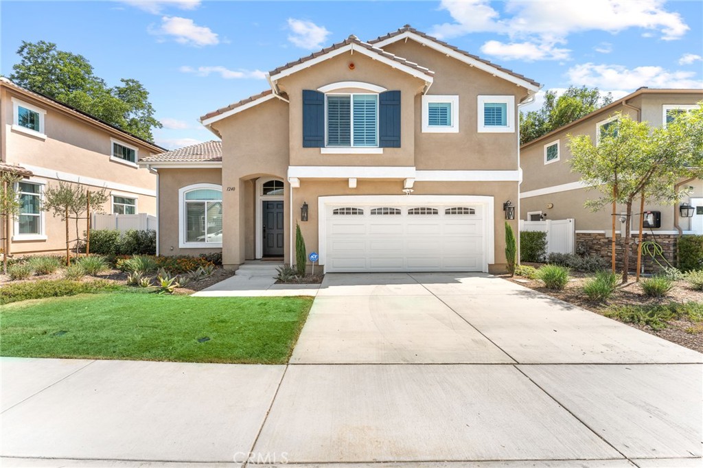 Welcome to this nearly-new 2-year-old beauty offering 4 spacious bedrooms and 3 full baths across 2,134 sq. ft. of modern living space. This home combines comfort and style with its open-concept layout, abundant natural light, and thoughtfully designed floor plan perfect for both relaxing and entertaining. The gourmet kitchen boasts sleek countertops, ample cabinetry, and a center island that flows seamlessly into the dining and living areas. The primary suite features a luxurious en-suite bath and walk-in closet, while the additional bedrooms provide plenty of room for family, guests, or a home office. Outside, enjoy a private backyard ideal for gatherings or quiet evenings. Located in a desirable neighborhood close to shopping, dining, parks, and schools—this home is truly move-in ready.