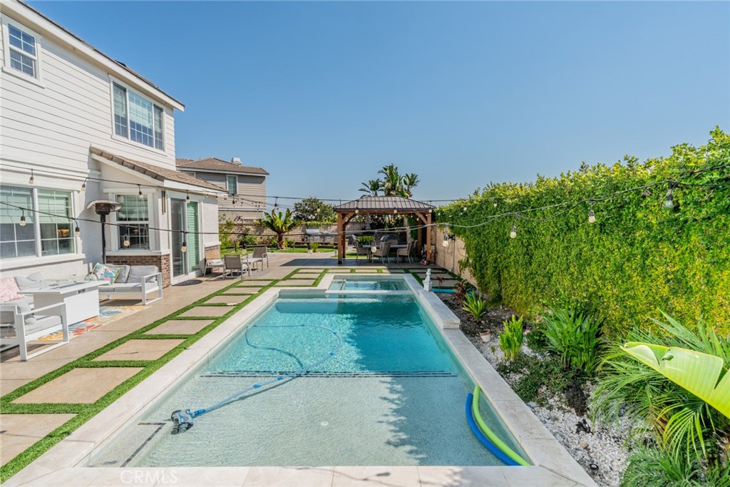 Welcome to your dream Pool home! This stunning 5-bedroom, 3.5-bath residence boasts 2,688 sq ft of living space on a 7,821 sq ft lot and is loaded with upgrades inside and out. Step inside to find beautiful laminate flooring throughout, plantation shutters, double-pane windows, and motorized shades. The spacious layout includes a formal living and dining room, a large family room, and a downstairs bedroom with a full bath perfect for guests.The kitchen features quartz countertops, new cabinets, stainless steel appliances, a breakfast bar, and abundant storage. Upstairs, the primary suite offers a walk-in closet, dual sinks, a soaking tub, and a separate shower. Solar panels $145 a month ,upgraded front yard and driveway.
The Remodeled backyard is an entertainer’s paradise with a brand-new pool, gorgeous landscaping, a fire pit area, new lighting, and a brand-new shed plus breathtaking mountain views .Hypoxi garage flooring and a smart Wi-Fi sprinkler system.
Located in a quiet, beautiful neighborhood within the Etiwanda School District, close to shopping, schools, and freeways. No HOA! This Alexa-enabled smart home is completely turnkey and ready for its new owner.