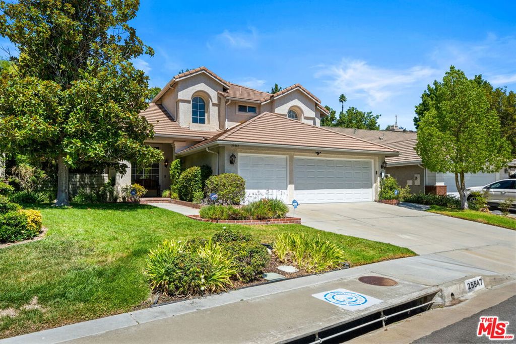 Nestled on a quiet cul-de-sac in one of Stevenson Ranch's most sought-after neighborhoods, this beautifully upgraded 4-bedroom, 3-bathroom home offers over 2,000 square feet of refined living space on an expansive lot featuring a custom-built pool and spa. Designed with both comfort and function in mind, this home perfectly balances everyday livability with timeless style.At the heart of the home, the gourmet kitchen is a true show stopper designed for both beauty and efficiency, it features stainless steel appliances, ample cabinetry, and a seamless connection to the bright breakfast area. Just beyond, the inviting family room offers a cozy fireplace and direct access to the private backyard oasis ideal for relaxing evenings or poolside entertaining.Toward the front of the home, the formal living room makes a bold first impression with soaring vaulted ceilings and oversized windows that bathe the space in natural light. A separate formal dining room provides the perfect setting for gatherings or can easily adapt to your lifestyle as an additional lounge or flex space. The main level also includes a full bathroom and a private office (4th bedroom), ideal for remote work or guests. Upstairs, the spacious primary suite serves as a peaceful retreat with high ceilings and a spa-inspired en-suite bath, complete with dual vanities, a soaking tub, walk-in shower, and generous closet space. Two additional bedrooms on the upper level are filled with natural light and share a well-appointed full bathroom.Additional features add even more value to this exceptional home. The oversized three-car garage has been upgraded with custom floor-to-ceiling cabinetry, offering incredible storage and organization an ideal blend of function and style, the wide driveway offers additional off street parking and a tesla charging station. The indoor laundry room is thoughtfully positioned on the main level, providing added comfort and ease of use. Step outside to the beautifully landscaped backyard, where a covered patio invites al fresco dining or lounging, and the custom pool and spa create a private resort-like setting perfect for hosting or unwinding in style.Located within close proximity to award-winning schools and the popular Richard Rioux Park with tennis courts, basketball courts, and open green space this home offers a highly desirable lifestyle. Enjoy the benefits of a low HOA and close proximity to shopping, dining, and easy freeway access. With its upgraded features, versatile layout, and prime location, this Stevenson Ranch stunner is a rare find that checks every box. Sale is contingent on seller finding a replacement home of their choice.
