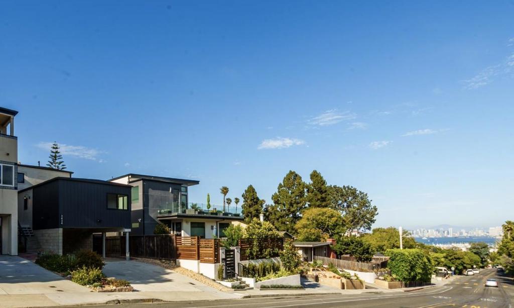 Turn-Key Designer Remodel with Bay and Bridge Views & Ultimate Indoor-Outdoor Living, at its Finest. Seller will entertain offers starting at 1,849,999. Full remodel blending modern luxury and functional design. This 3-bedroom, 2.5 bathroom home offers 1,717 square feet of open-concept living space with no detail overlooked. Step inside to new engineered hardwood flooring throughout, natural light with a layout that seamlessly connects the gourmet kitchen, living, and dining areas. The chef’s kitchen is a showstopper, featuring brand new cabinetry, natural stone quartzite countertops, Monogram Elite appliances, under-cabinet lighting, and expansive kitchen island. Designed for indoor-outdoor living, cantina-style folding doors/windows open to a beautifully landscaped and irrigated backyard retreat—complete with a new deck and spacious entertaining patio perfect for gatherings, dining al fresco, or simply relaxing under the stars. Every system in the home has been updated: new windows and doors throughout, new insulation, tankless water heater, central heat and air, and smart recessed lighting with dimmable switches. The bathrooms are thoughtfully appointed with lighted anti-fog mirrors, premium fixtures, and elegant finishes. The exterior is equally impressive with a brand new smooth coat stucco finish, new exterior lighting, and Ring security cameras for peace of mind. Truly turn-key, this home is ready for its new owners to move in and start enjoying the elevated lifestyle it offers.