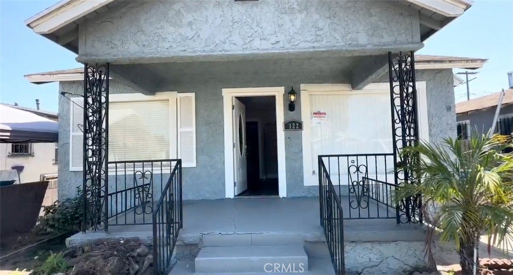 Charming single-story home offering 3 bedrooms and 2 bathrooms. Enjoy a welcoming front porch, spacious living room with fireplace, and a primary bedroom with its own fireplace and sliding glass door to the backyard. Separate dining room and living room provide versatile spaces for gatherings. A detached 2-car garage adds convenience and storage. Schedule a showing today! One or more photos may be virtually staged.