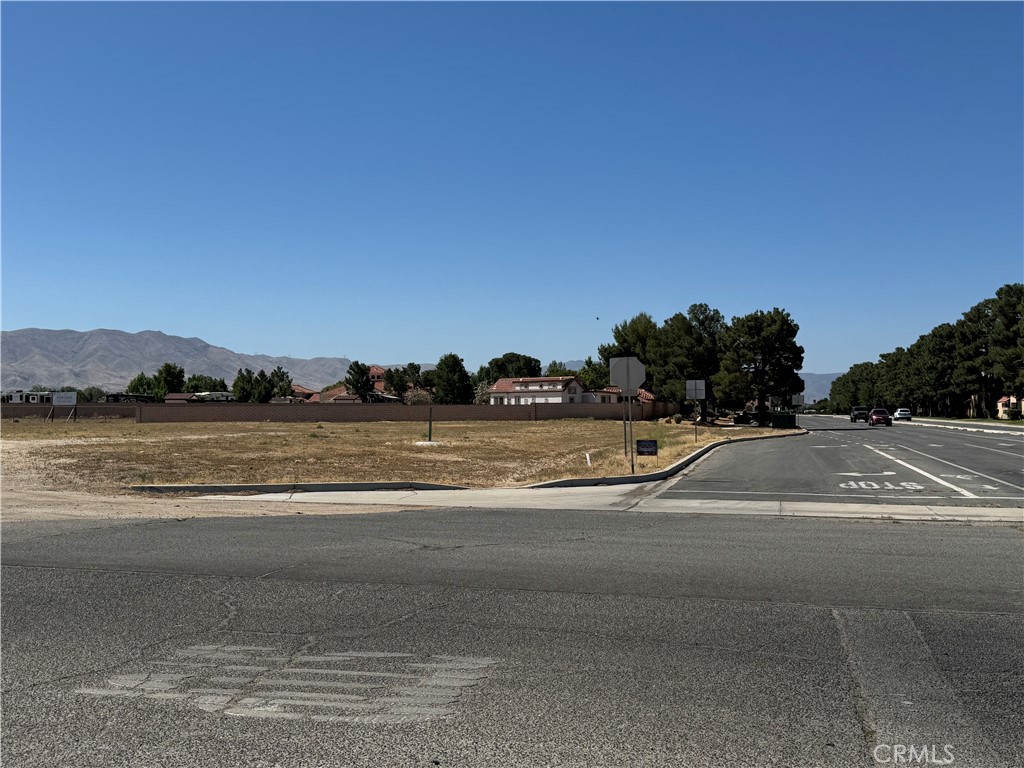 LOCATION, LOCATION & LOCATION!! 1.2 acre of prime Commercial Land located right on the corner of Apple Valley Rd and Town Center Dr. zoned Commercial!! Nice and flat same level with street and have all utilities including water, power, and sewer at site. OC Zoned uses: offices, commercial recreational facilities, retail, food service, convalescent hospitals, etc. 1 block away from the corner of Apple Valley Rd and Bear Valley Rd consist of Jess Ranch Market Place, Target Shopping Center, Stater Bros. Shopping Center, Home Depot and Lowes. The land is and right across of from Whispering Winds of Apple Valley, a assisted senior living, and Citizen Business Bank. Town of Apple Valley has many on going and upcoming billion dollars of developments including: Brightline West’s future High Speed Rail Stations that will be Connecting Downtown Los Angeles to the Las Vegas Strip. These developments are bringing thousands of jobs!! An ultimate location for an immediate development. Endless Possibilities!! Seller also owns other adjacent 3 parcels total of 4 parcels that are also on the market for sale! MOTIVATED SELLER!