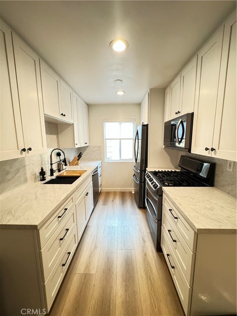 Photo of 9950 Jordan Avenue #8, Chatsworth, CA 91311 (MLS # SR26203818)