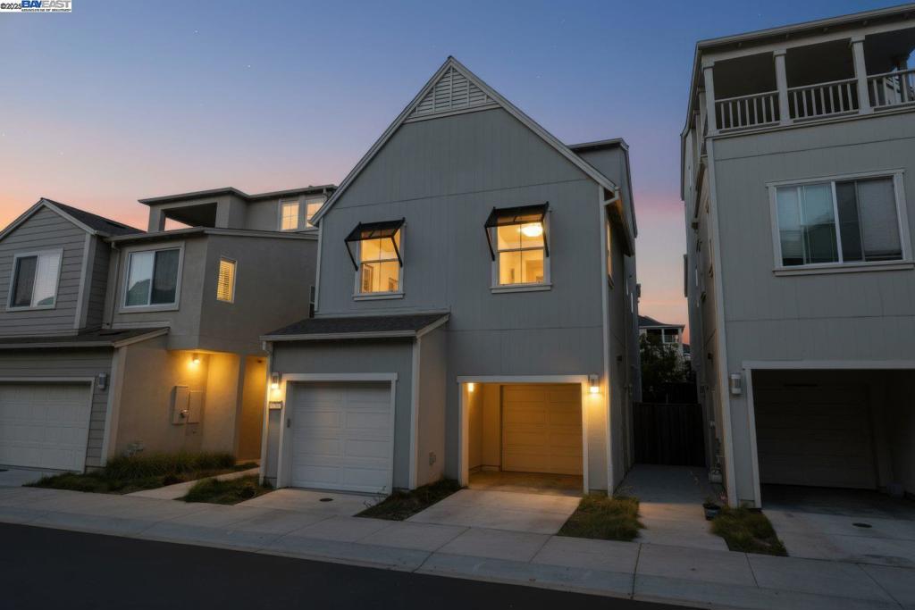 Beautiful and modern home featuring 4 bedrooms, 2.5 bathrooms, and approximately 2,041 square feet of living space. The functional floor plan includes a split 2-car garage with one driveway. Upgraded wood flooring and carpet flow throughout the home. The chef’s kitchen showcases an upgraded island, quartz countertops with backsplash, and premium stainless steel appliances. The spacious bonus room on the third floor offers a scenic view, covered deck, and is perfect for an office, media room, or entertaining—complete with projector and cinema hookups. The landscaped backyard includes a sprinkler system for easy maintenance. Located in the desirable Bayshores community near Facebook, Tesla, and other major employers, residents enjoy access to a private clubhouse, community park, and children’s playground. Nearby Don Edwards San Francisco Bay National Wildlife Refuge provides miles of scenic trails and open space to explore. Easy access to the Dumbarton Bridge and I-880 for convenient commuting.