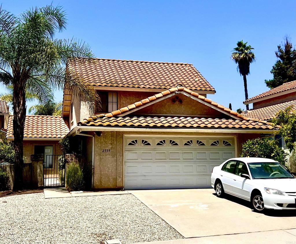 Welcome to your new forever home! Enjoy peaceful living in this 3-bed, 2-bath North Escondido gem, where horses often pass by and nature sets the tone. The primary bedroom is conveniently located on the main level, with vaulted ceilings in the living room that create a bright, airy feel. Relax on the tranquil back patio or take advantage of the spacious two-car garage. Just minutes from town.