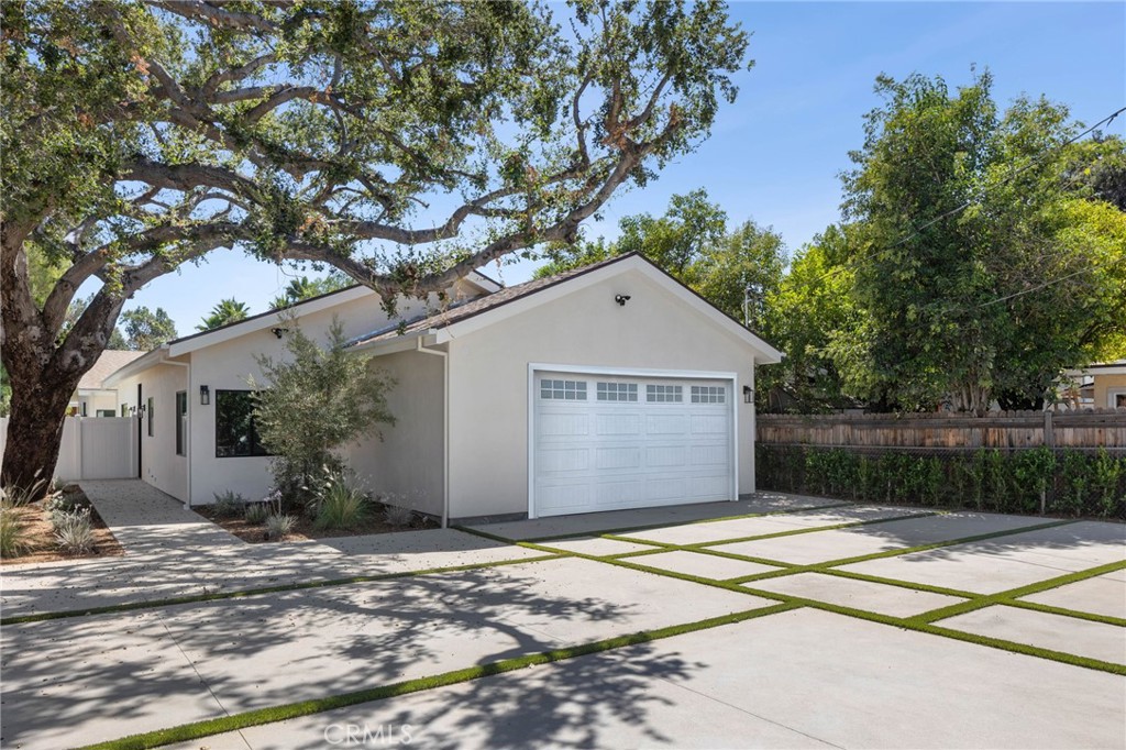 Most stunning home in Canoga park, adjacent to Woodland hills! come see this new construction beauty with lots of attention to details, featuring 3 bed 2 bath very specious and full of natural light. enter this beautiful home and enjoy the open floor plan with the living room and new kitchen and large island, the house features with all brand new appliances.the master bedroom has its own large bathroom and walking closet, and the home features washer and dryer in the hallway. plenty of storage space and so much more.two assigned and gated parking spots are also available. this beautiful street is located just minuets from Topanga mall, The village, Shopping, restaurants and so much more!!